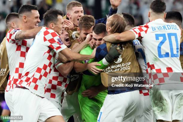Dominik Livakovic of Croatia celebrates the win via a penalty shootout during the FIFA World Cup Qatar 2022 quarter final match between Croatia and...