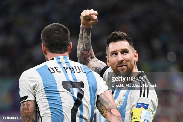 Rodrigo De Paul and Lionel Messi of Argentina celebrate their side's first goal during the FIFA World Cup Qatar 2022 quarter final match between...