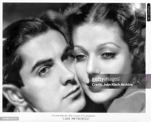 Publicity still of American actors Tyrone Power and Loretta Young in the film 'Cafe Metropole,' 1937.