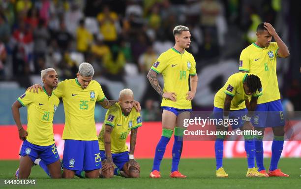 L-r Rodrygo, Pedro, Neymar, Antony, Fred and Alex Sandro of Brazil show their disappointment during the penalty shootout during the FIFA World Cup...