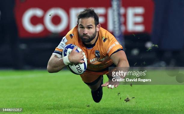 Cobus Reinach of Montpellier dives to score their first try during the Heineken Cup match between London Irish and Montpellier at Gtech Community...