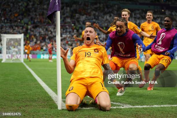 Wout Weghorst of Netherlands celebrates after scoring the team's second goal during the FIFA World Cup Qatar 2022 quarter final match between...