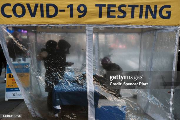 Testing site stands on a sidewalk in Midtown Manhattan on December 09, 2022 in New York City. While COVID-19 numbers have dropped significantly in...