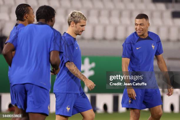 Antoine Griezmann of France, Kylian Mbappe of France during France training session on match day -1 at Al Sadd SC Stadium on December 09, 2022 in...