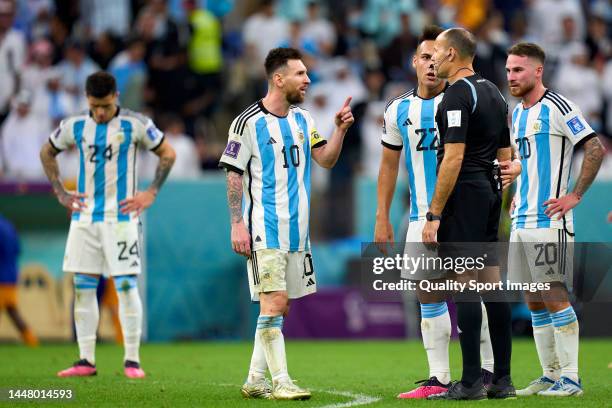 Lionel Messi of Argentina argues with the Referee Antonio Mateu Lahoz of Spain during the FIFA World Cup Qatar 2022 quarter final match between...