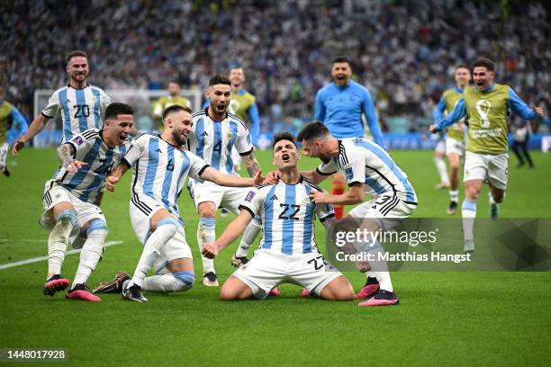 Argentina players celebrate after their win in the penalty shootout during the FIFA World Cup Qatar 2022 quarter final match between Netherlands and...