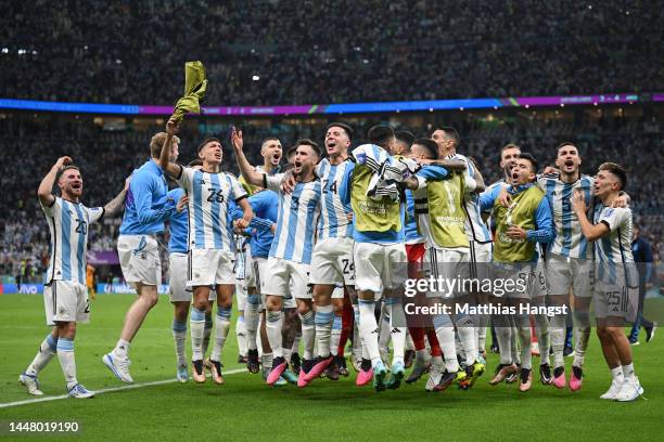 Argentina players celebrate after their win in the penalty shootout during the FIFA World Cup Qatar 2022 quarter final match between Netherlands and...