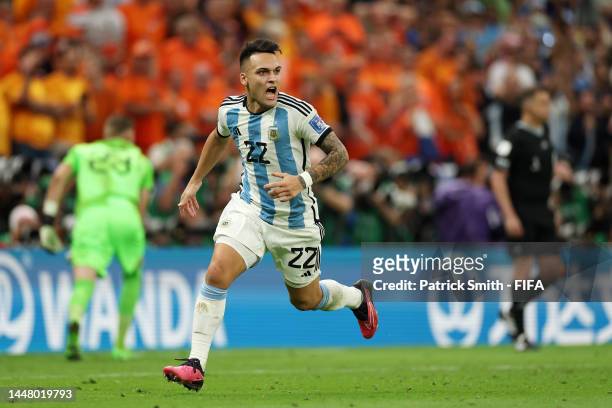 Lautaro Martinez of Argentina celebrates after scoring the team's fifth and winning penalty in the penalty shoot out during the FIFA World Cup Qatar...