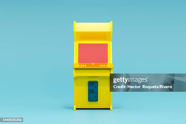 3d rendering of arcade machine with yellow, blue colors and red screen in blue background, games concept - amusement arcade stock-fotos und bilder