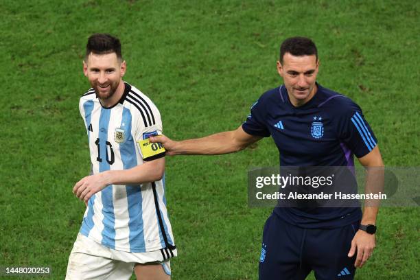 Lionel Scaloni, Head Coach of Argentina, celebrates with Lionel Messi after the win in the penalty shootout during the FIFA World Cup Qatar 2022...