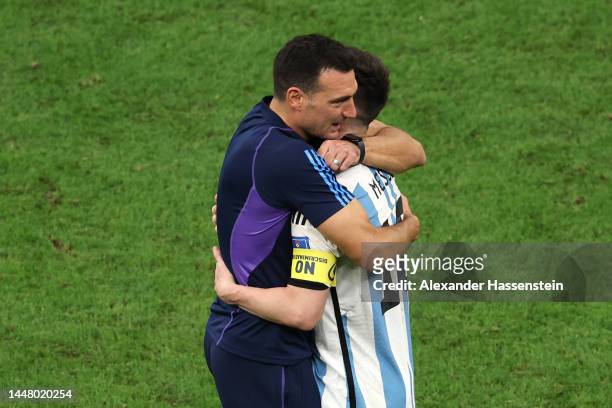 Lionel Scaloni, Head Coach of Argentina, celebrates with Lionel Messi after the win in the penalty shootout during the FIFA World Cup Qatar 2022...