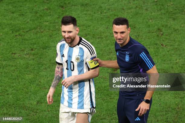 Lionel Scaloni, Head Coach of Argentina, celebrates with Lionel Messi after the win in the penalty shootout during the FIFA World Cup Qatar 2022...