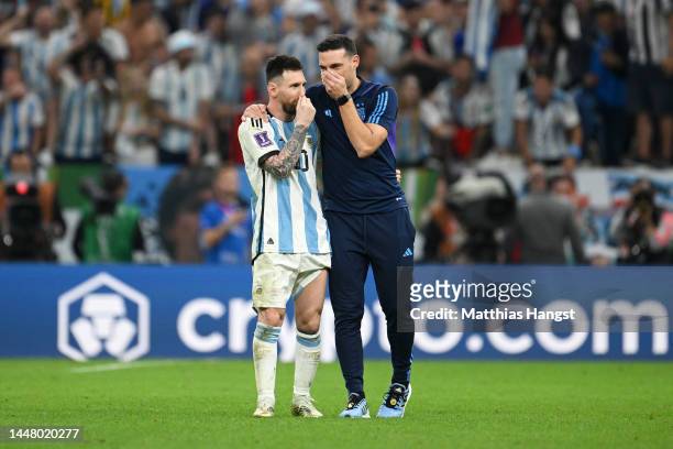 Lionel Scaloni, Head Coach of Argentina, celebrates with Lionel Messi after the win in the penalty shootout during the FIFA World Cup Qatar 2022...