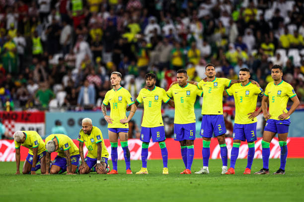Players of Brazil react in the penalty shoot out during the FIFA World Cup Qatar 2022 quarter final match between Croatia and Brazil at Education...