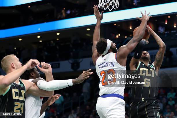 Jalen McDaniels of the Charlotte Hornets attempts a shot against Mitchell Robinson of the New York Knicks during the first quarter of the game at...