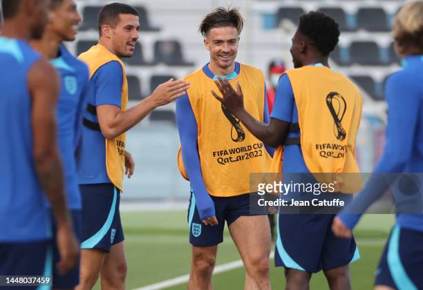 Jack Grealish, Conor Coady of England during the England training session on match day -1 at the Al Wakrah Sports Club on December 9, 2022 in Doha,...
