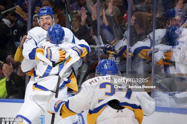 Tyson Jost and Victor Olofsson of the Buffalo Sabres celebrate after a goal by Olofsson during the second period of an NHL hockey game against the...