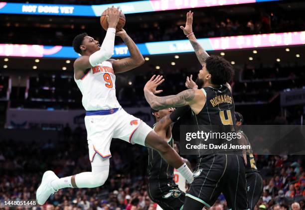 Barrett of the New York Knicks drives to the basket during the second half of the game against the Charlotte Hornets at Spectrum Center on December...