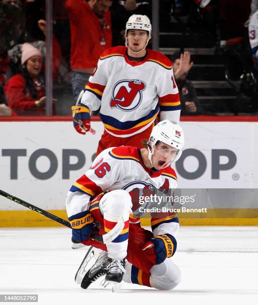 Jack Hughes of the New Jersey Devils celebrates his third period goal against the New York Islanders at the Prudential Center on December 09, 2022 in...