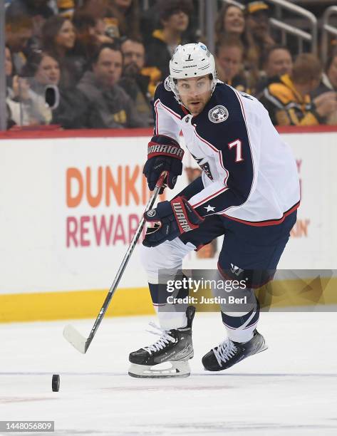 Sean Kuraly of the Columbus Blue Jackets skates with the puck in the second period during the game against the Pittsburgh Penguins at PPG PAINTS...