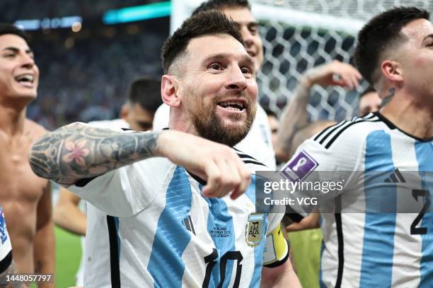 Lionel Messi of Argentina and team mates celebrate victory after the FIFA World Cup Qatar 2022 quarter final match between Netherlands and Argentina...