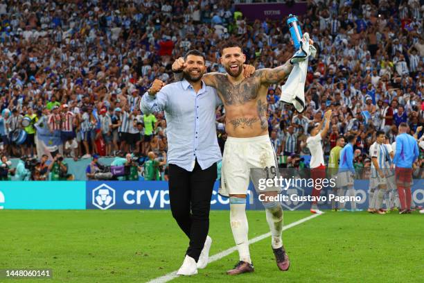 Nicolas Otamendi of Argentina celebrates with Sergio Aguero after winning the FIFA World Cup Qatar 2022 quarter final match between Netherlands and...