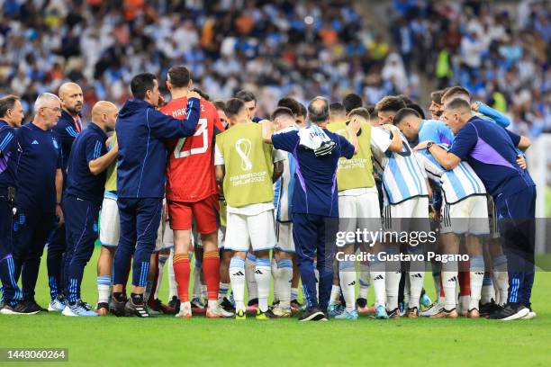 Players of Argentina huddle during the FIFA World Cup Qatar 2022 quarter final match between Netherlands and Argentina at Lusail Stadium on December...
