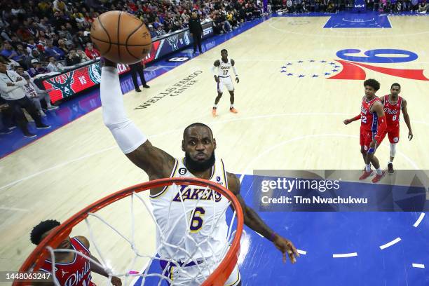 LeBron James of the Los Angeles Lakers elevates for a dunk during the second quarter against the Philadelphia 76ers at Wells Fargo Center on December...
