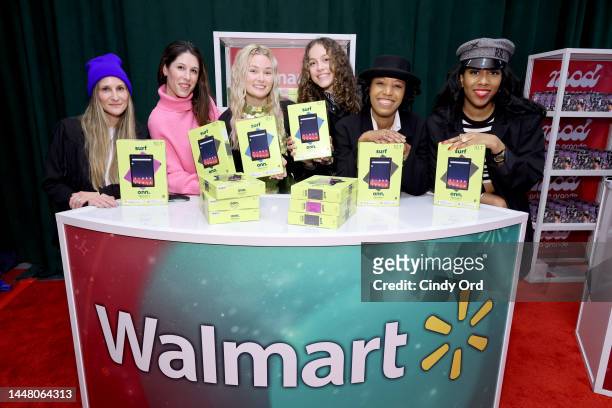 Claire Liz Wenrick and Tania Cascilla with guests attend the iHeartRadio Z100's Jingle Ball 2022 Gift Lounge at Madison Square Garden on December 09,...