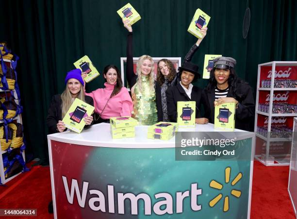 Claire Liz Wenrick and Tania Cascilla with guests attend the iHeartRadio Z100's Jingle Ball 2022 Gift Lounge at Madison Square Garden on December 09,...