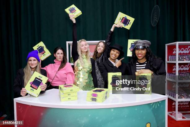 Claire Liz Wenrick and Tania Cascilla with guests attend the iHeartRadio Z100's Jingle Ball 2022 Gift Lounge at Madison Square Garden on December 09,...