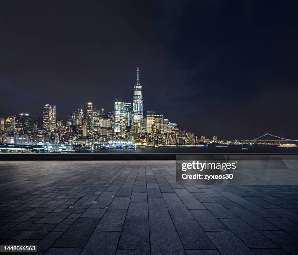 manhattan financial district in new york city at night - town square night stock pictures, royalty-free photos & images