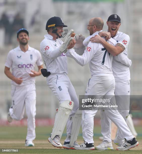 Jack Leach of England is congratulated on the wicket of Mohammad Rizwan of Pakistan during day two of the Second Test Match between Pakistan and...