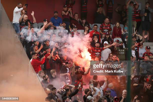 The crowd set off a flare during the round seven A-League Men's match between Wellington Phoenix and Western Sydney Wanderers at WIN Stadium, on...