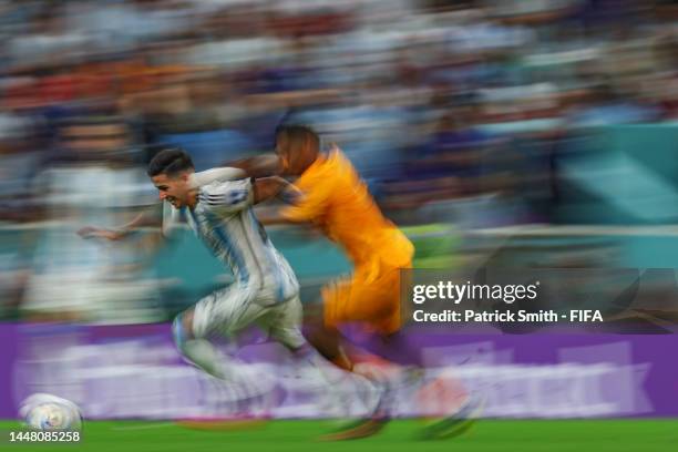 Enzo Fernandez of Argentina dribbles past Jurrien Timber of the Netherlands during the FIFA World Cup Qatar 2022 quarter final match between...