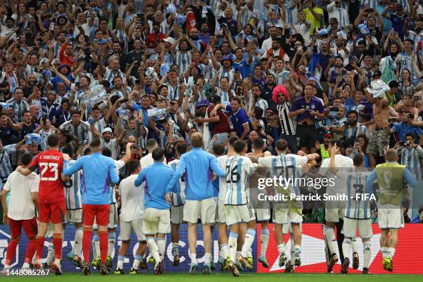 Supporters celebrate after the win in the penalty shootout during the FIFA World Cup Qatar 2022 quarter final match between Netherlands and Argentina...