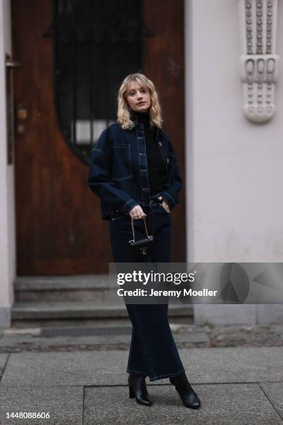 Trixi Giese seen wearing a denim look with a jeans and a jeans jacket by Blanche, a black turtleneck sweater, boots by Jimmy Choo and a Jimmy Choo...