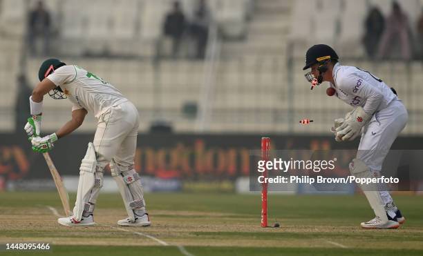 Mohammad Rizwan of Pakistan is bowled by Jack Leach and Ollie Pope is hit by the ball during the second day of the second Test between Pakistan and...