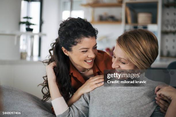mother and doughter spend time toogether - awkward family photo stock pictures, royalty-free photos & images