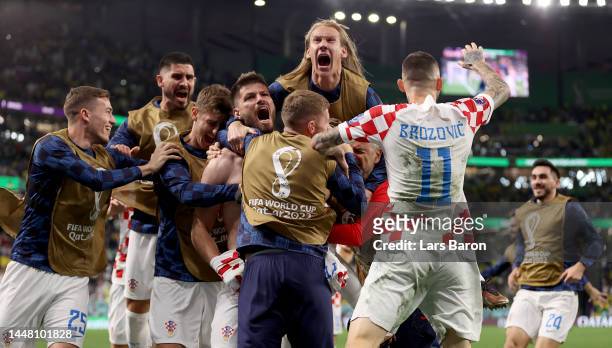 Bruno Petkovic of Croatia celebrates after scoring the team's first goal during the FIFA World Cup Qatar 2022 quarter final match between Croatia and...