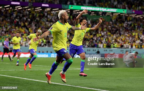 Neymar of Brazil celebrates after scoring his teams first goal during the FIFA World Cup Qatar 2022 quarter final match between Croatia and Brazil at...