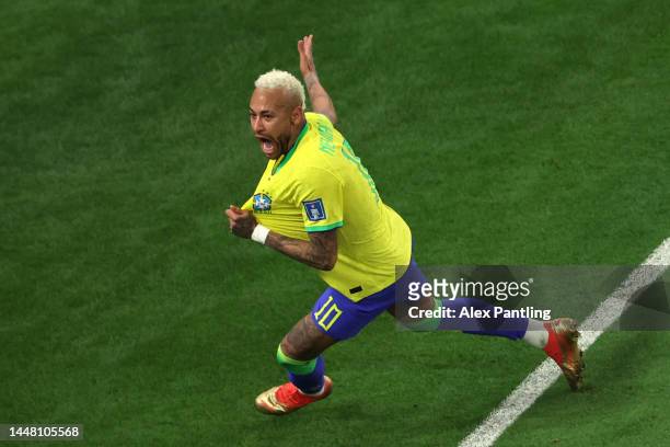 Neymar of Brazil celebrates scoring the sides first goal during the FIFA World Cup Qatar 2022 quarter final match between Croatia and Brazil at...