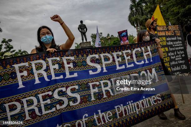Filipino activists take part in a protest to mark International Human Rights Day on December 10, 2022 in Manila, Philippines. Philippine human rights...