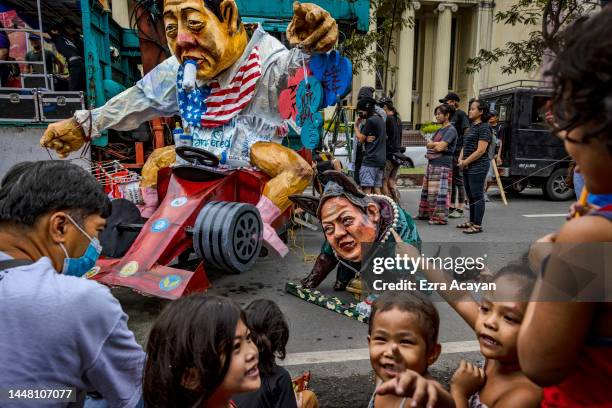 An effigy of Philippine President Ferdinand Marcos Jr. And Vice President Sara Duterte is seen during a protest to mark International Human Rights...