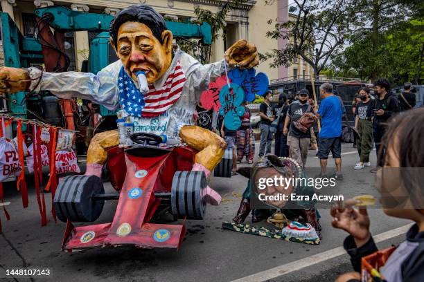 An effigy of Philippine President Ferdinand Marcos Jr. And Vice President Sara Duterte is seen during a protest to mark International Human Rights...