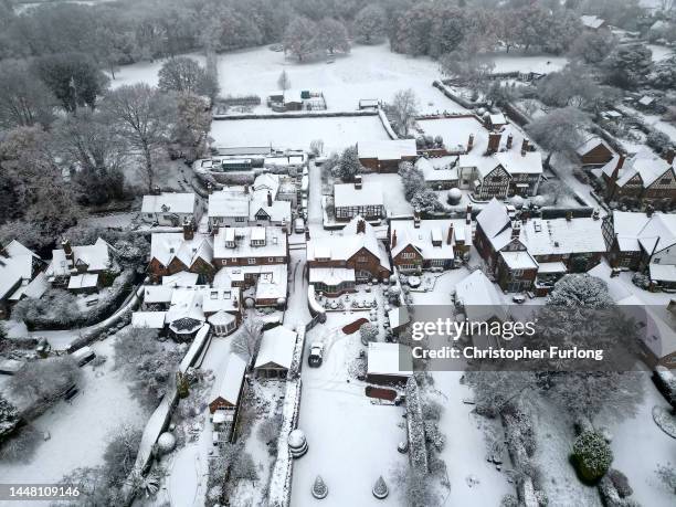 Homes in the village of Great Budworth are covered in snow after the first significant snow fall in Cheshire this Winter on December 10, 2022 in...