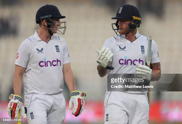 Harry Brook of England and Ben Stokes of England walk off at the end of the day during day two of the Second Test Match between Pakistan and England...