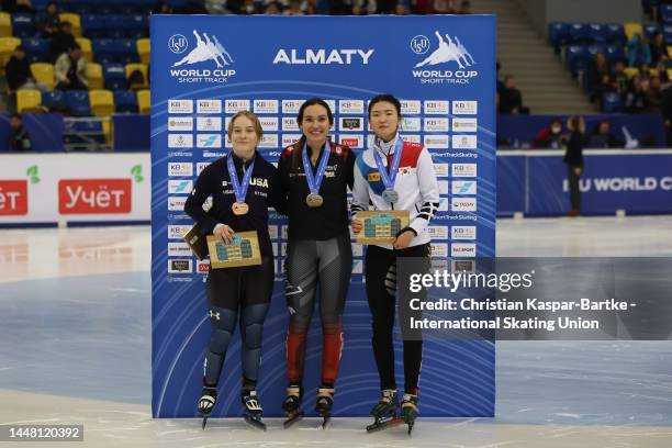 Corinne Stoddard of United States of America, Courtney Sarault of Canada and Suk Hee Shim of Korea pose on podium after medal ceremony of Women's...