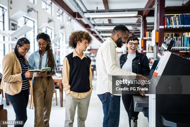 335 Scanning Books In The Library Stock Photos, High-Res Pictures, and ...