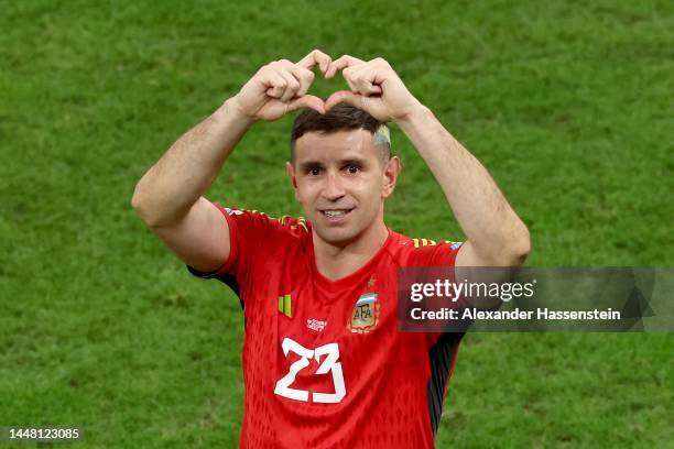 Emiliano Martinez of Argentina celebrates the team's victory through the penalty shootout in the FIFA World Cup Qatar 2022 quarter final match...